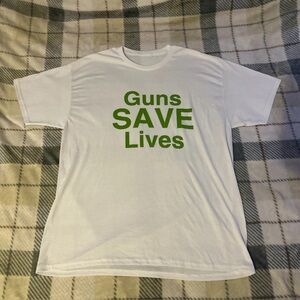 Men’s white “guns saves life’s” tee shirt